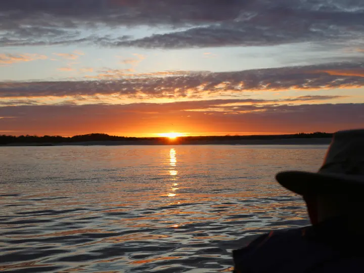 Sunrise over the sea from the deck of a cruise yacht